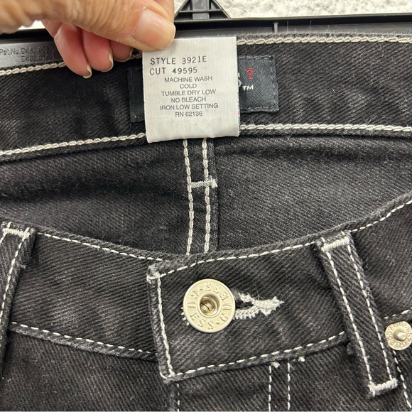 Guess women’s 26 black denim with white stripes on the side of each leg - Picture 6 of 8